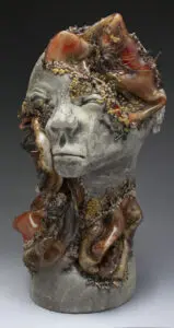 Alyssa Radtke, Infestation of Fixation, glass, ceramic, mixed media, 2022. 23 x 9 x 11".