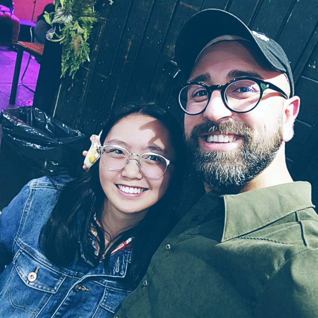 Student representatives Ibrahim Erdogan (right) and Leia Guo (left) pose together