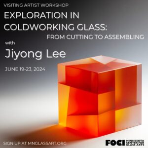 an orange glass cube with the title of the workshop in white text on a grey background