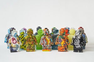 a group of colorful cast glass figurines