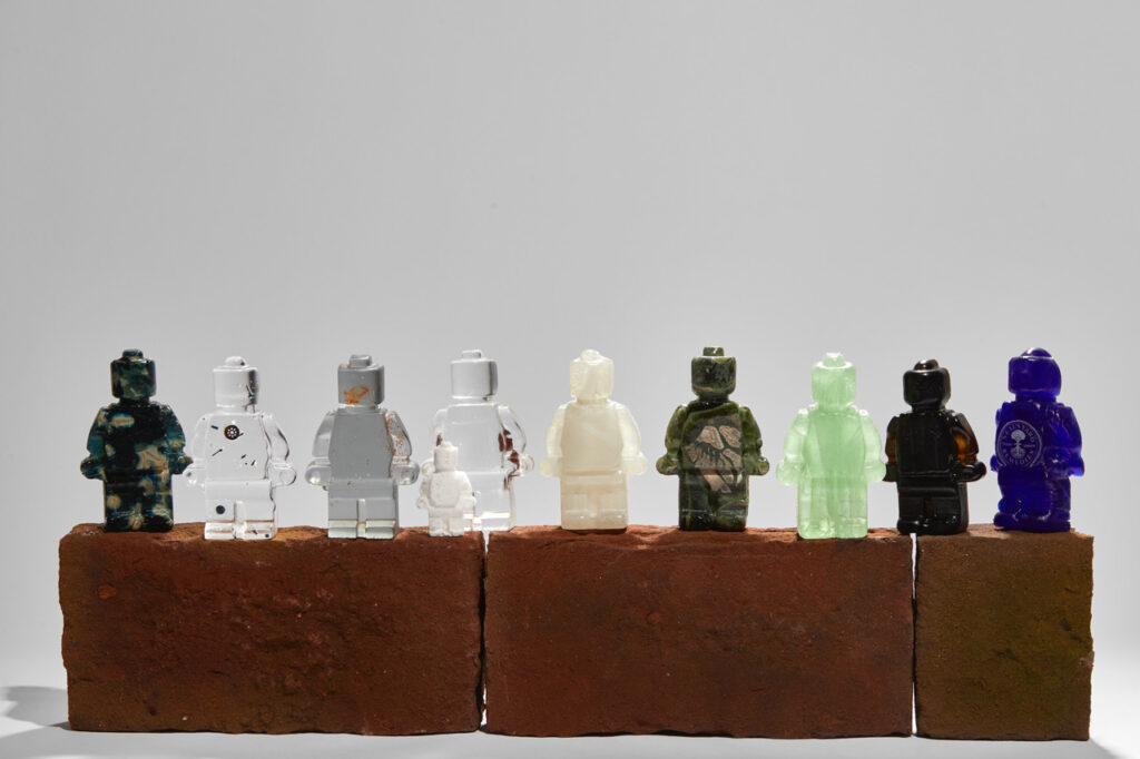 a group of cast glass figurines