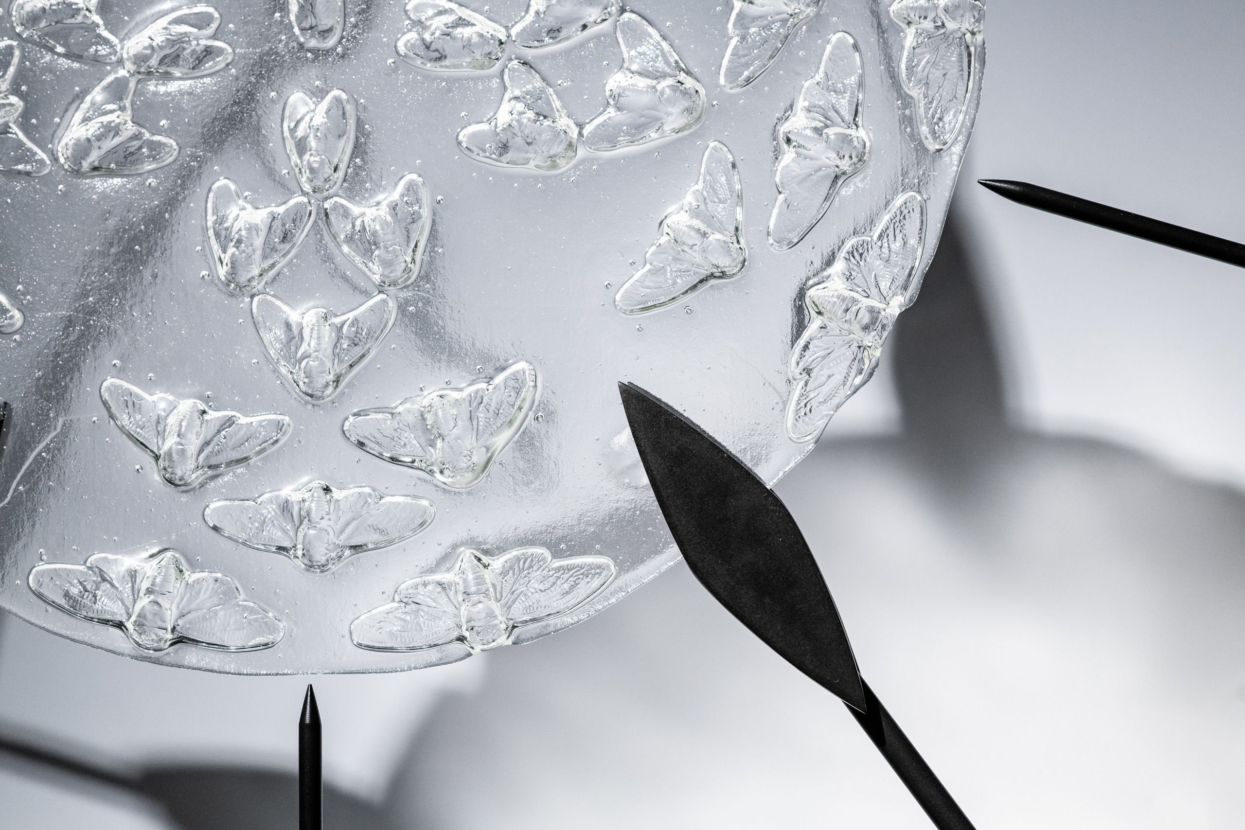 Liz Markum, Ascension (of Cicadas) (detail). Cast glass, steel, light. 85” x 36” x 2”, 2024. (Photo: Stephanie Gerhart)