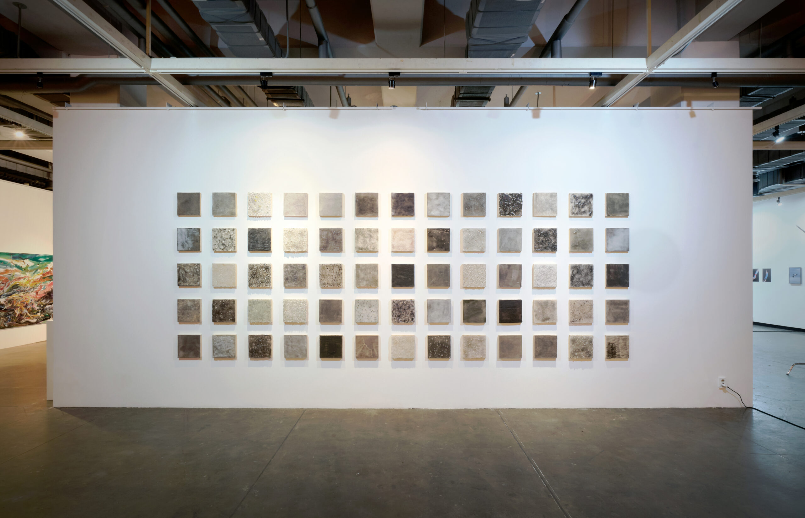Jiemin Park. Star 01-65. Fused glass powder on wood panel. 27 x 27cm per piece (65 pieces total), 2024. (Photo: Kwak Dongkyung)