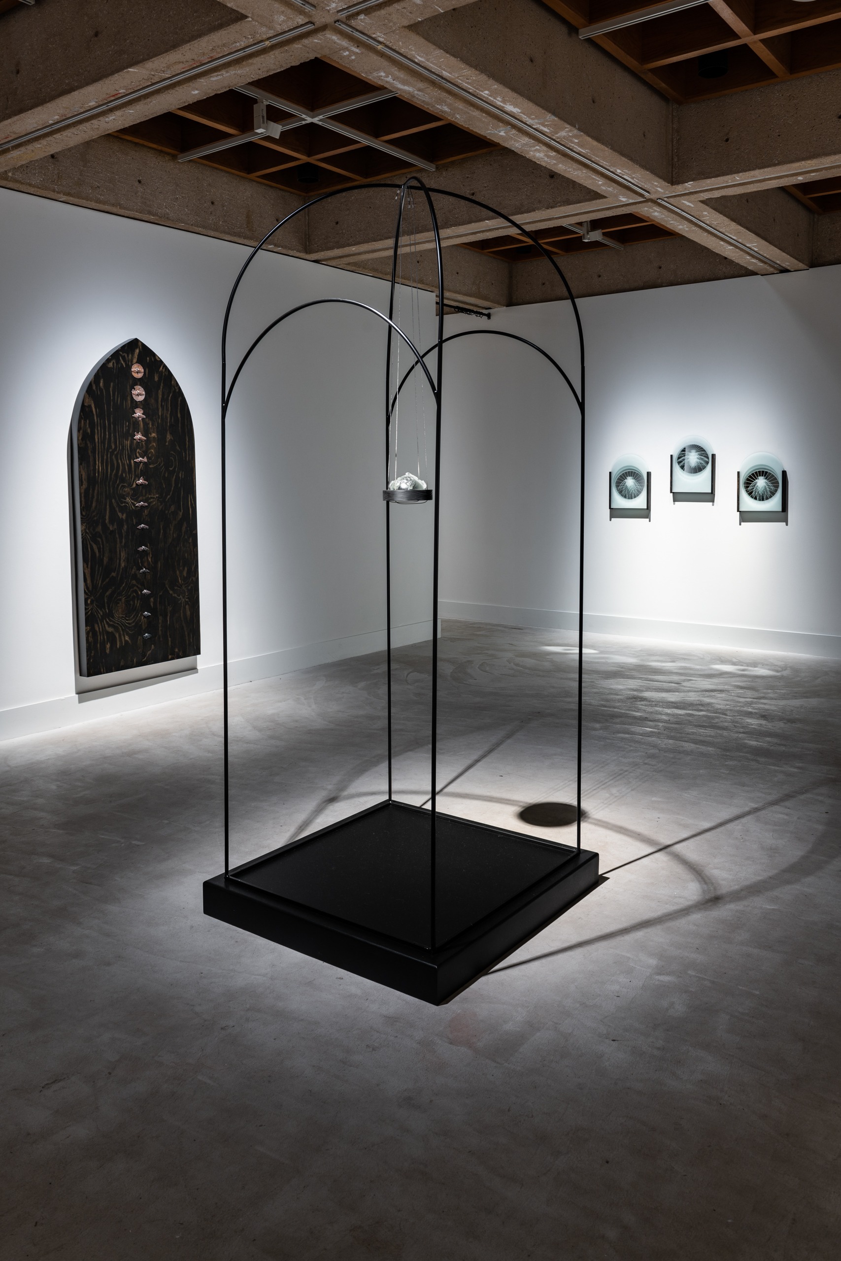Liz Markum, Between Here and the Celestial. Steel, cast glass, wood, light. 106” x 41” x 40”, 2024. (Photo: Stephanie Gerhart)