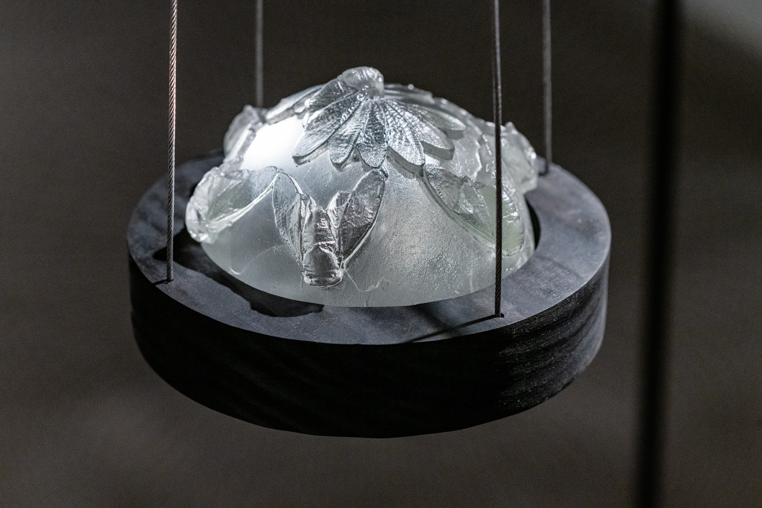 Liz Markum, Between Here and the Celestial (detail). Steel, cast glass, wood, light. 106” x 41” x 40” (Photo: Stephanie Gerhart)