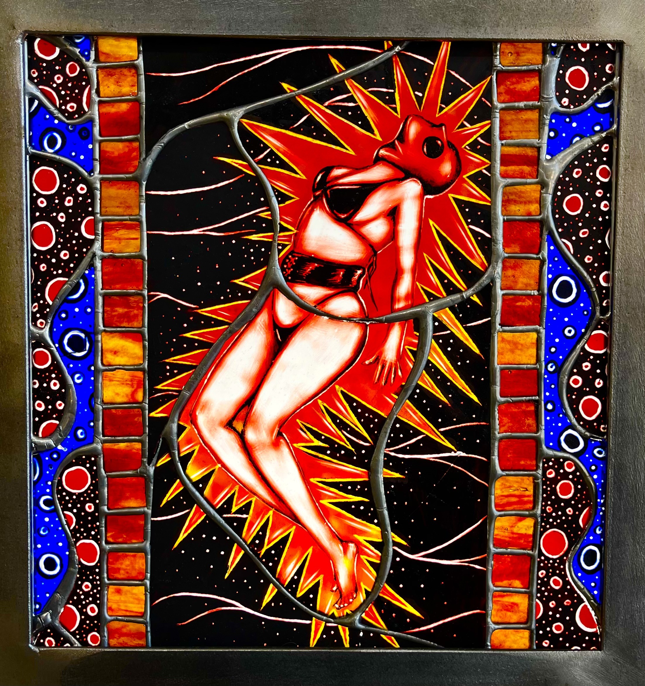 Karisa Gregorio, Transcendence. Flash glass, colored sheet glass, reusche, silver stain. 10”x 9”. (Photo: Andrew Clark).
